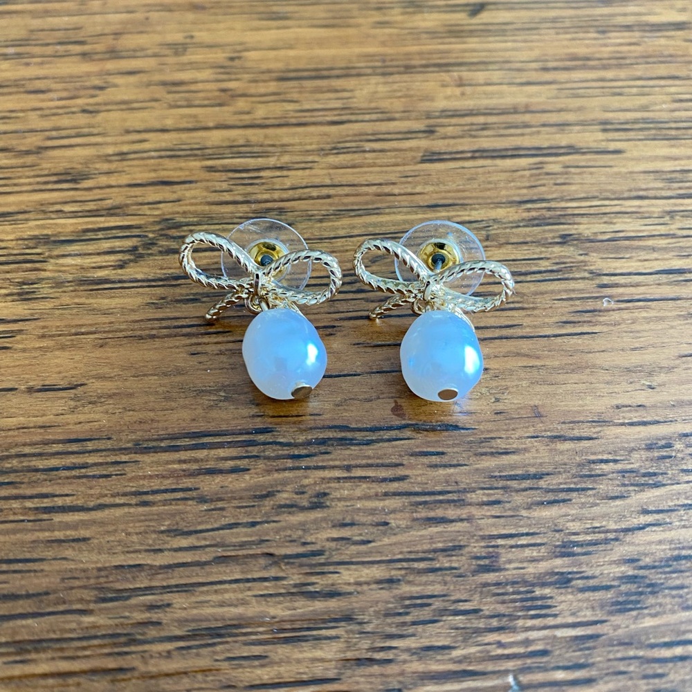 Elegant Gold and White Bow Earrings